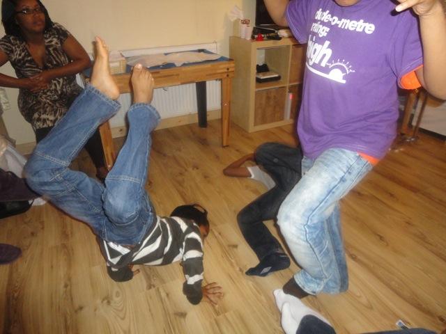 Breakdancing fun at a party. Taken with Sony DSC TX9